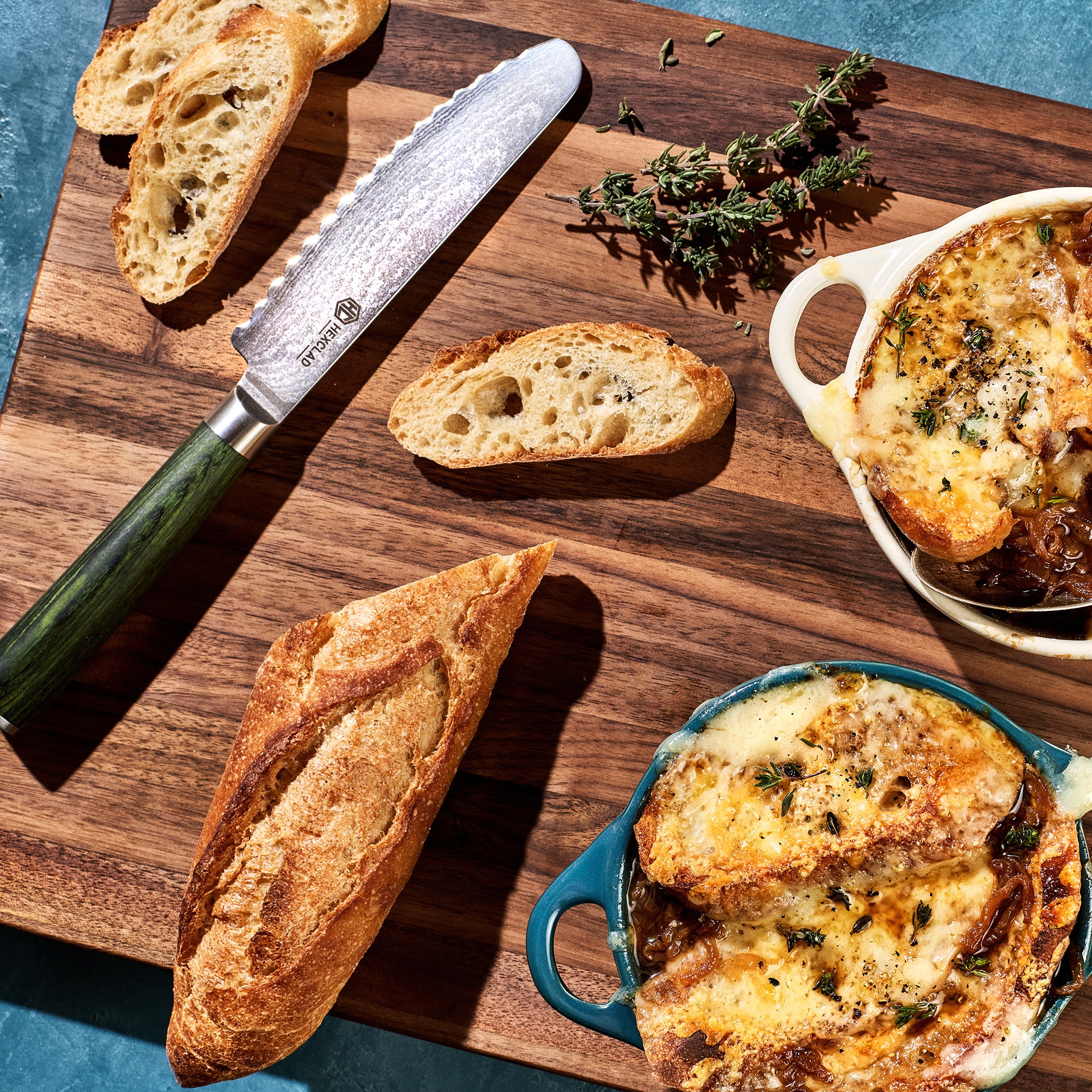 HexClad_MediumWalnutBoardV2_KWWB20-V2_5_BreadKnife_CTBK05-GPW_FrenchOnionSoup_012325_KF_02_03e3a333-0b0c-49da-bb00-01b7a0e5a2df